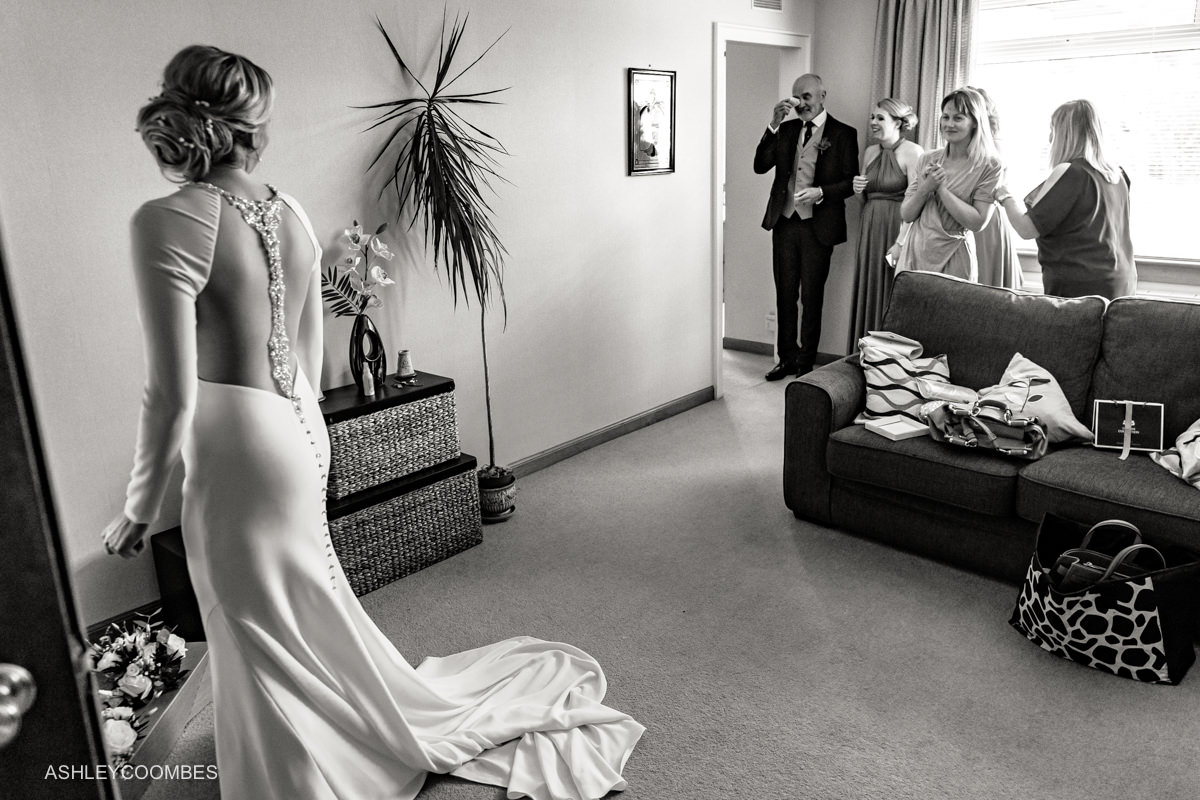 Bride father sees her in dress