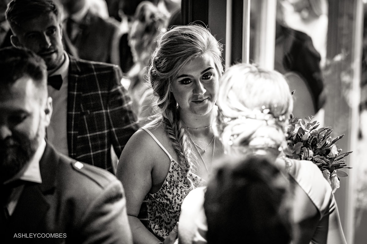 guest greets bride