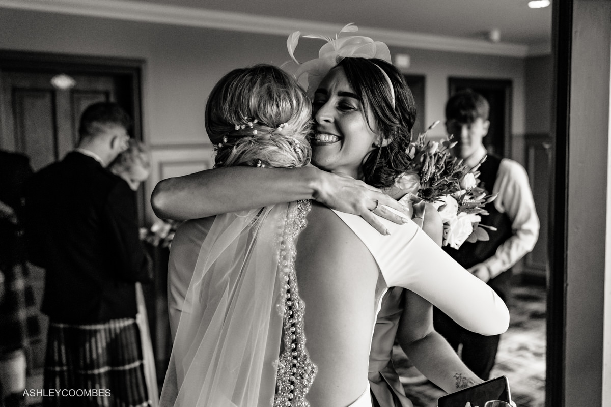 friend congratulates bride