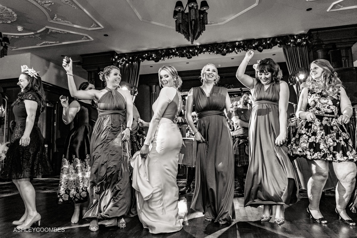 bride and bridesmaid dancing